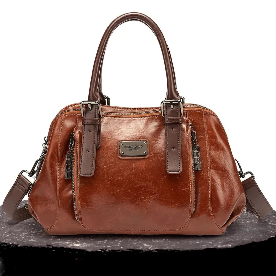 Isla’s Regal Charm | Classic Leather Satchel