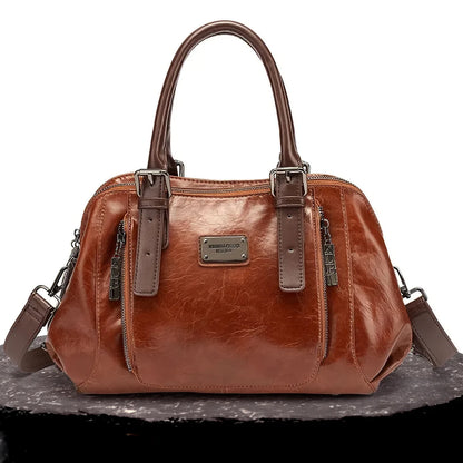 Isla’s Regal Charm | Classic Leather Satchel